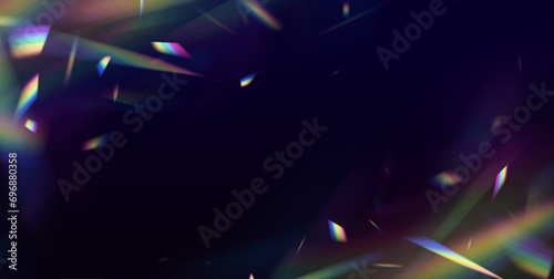 A cluster of colors, bright rays of the spectrum. Glare on a lens, glass, jewelry, or gemstone. Bright light banner, poster, template.  Overlay for backgrounds.