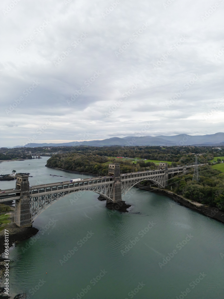 Aerial View Of Britannia Bridge carries road and railway across the Menai Straits between, Snowdonia and Anglesey. Wales, United Kingdom Aerial 