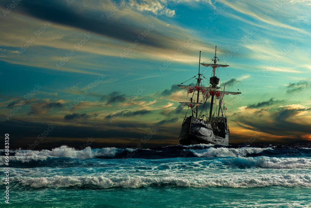 Grand view of an old sailing ship from the times of pirates and the Middle Ages on the high seas with big waves and with a beautiful sky