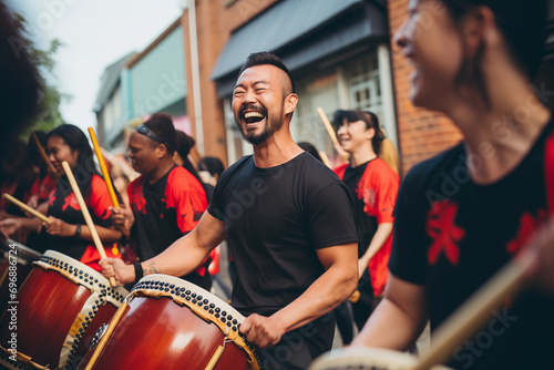 Taiko drummers in action, leaving space for a message on rhythm and unity