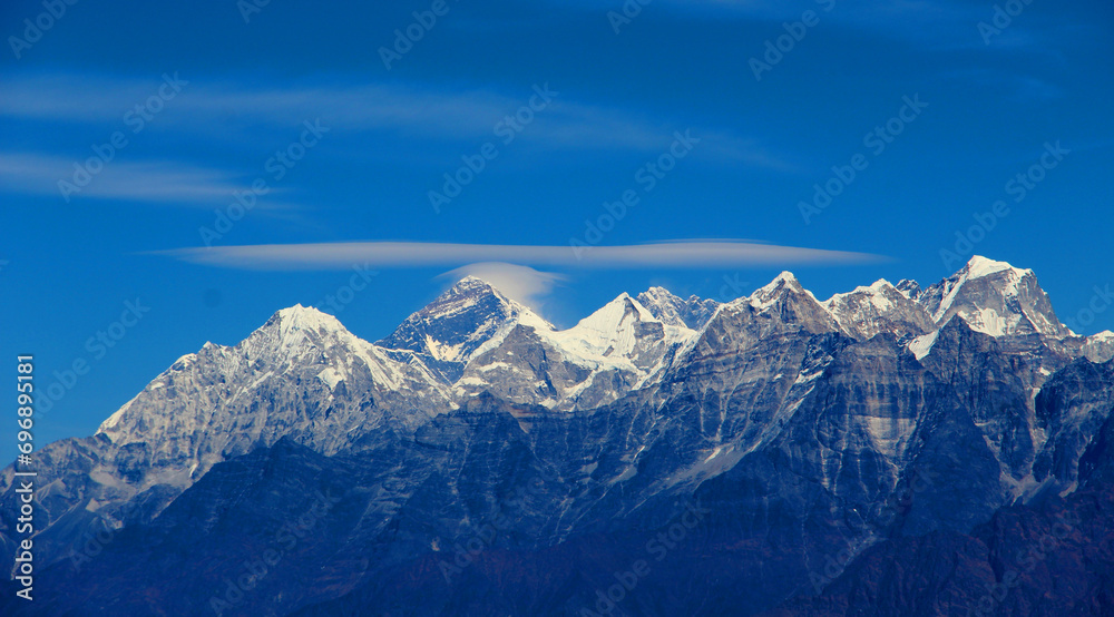 Mount Everest is Earth's highest mountain above sea level, located in the Mahalangur Himal sub-range of the Himalayas. Mount Everest view from Solukhumbu, Nepal.