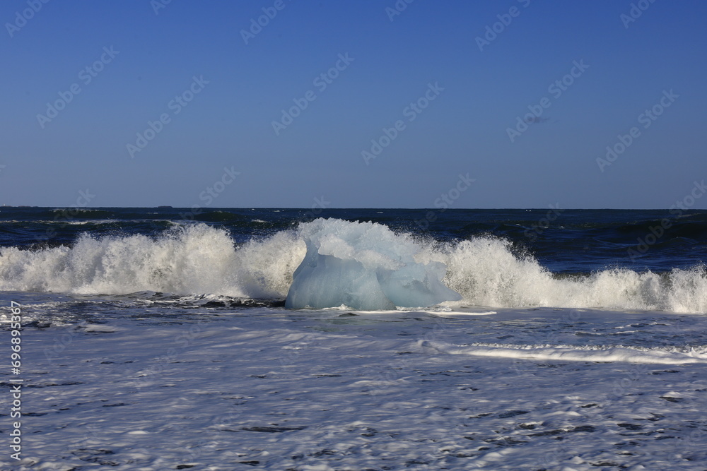 View on a iceberg on the Diamond Beach located south of the Vatnajökull glacier between the Vatnajökull National Park and the town of Höfn View on a iceberg on the Diamond Beach located south of the Vatnajökull glacier between the Vatnajökull National Park and the town of Höfn