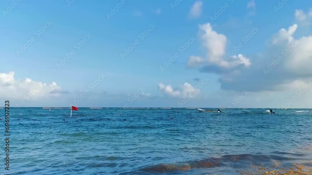 Red flag swimming prohibited high waves Playa del Carmen Mexico. Red flag swimming prohibited high waves Playa del Carmen Mexico.