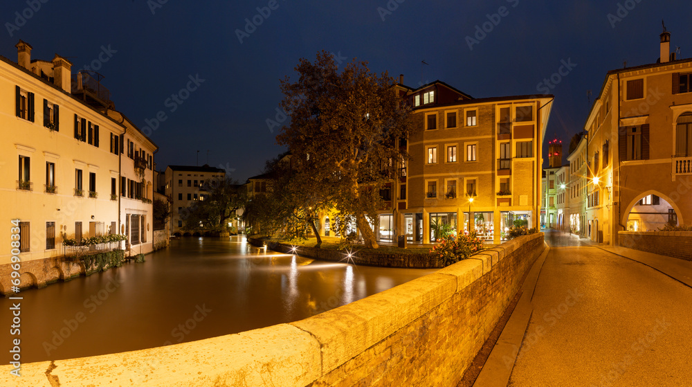 Treviso - The old town with canal of the Sile river at dusk.