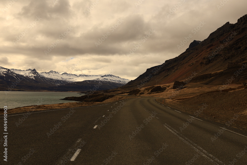 View on a road in the Fáskrúðsfjörður fjord located in the east of Iceland, in the Austurland region