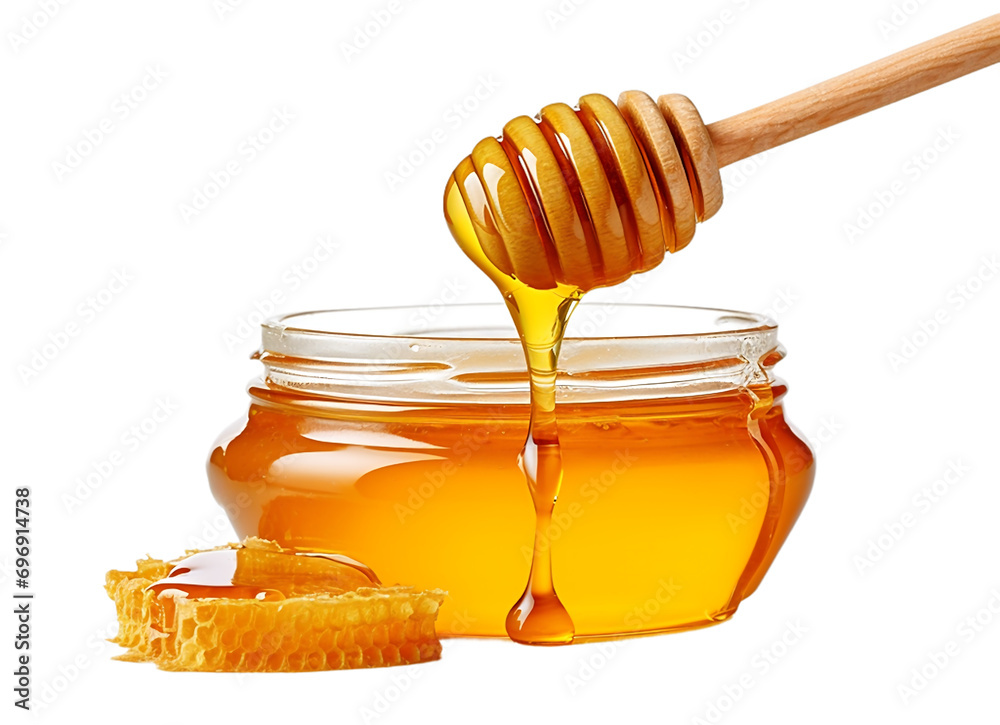 Honey dripping from a wooden honey dipper into a jar isolated on transparent background.The concept of organic honey as an ingredient for food, beverage and beauty products.