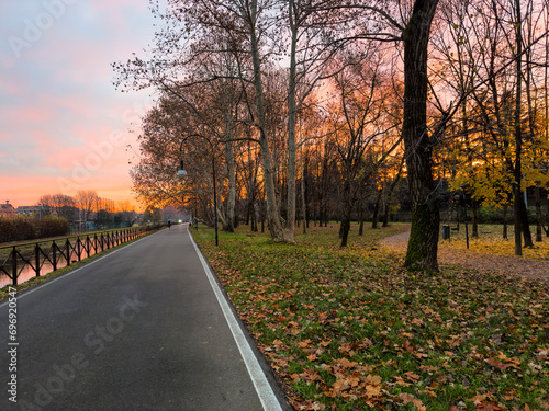 Cycle path along the Naviglio in Milan at dawn.