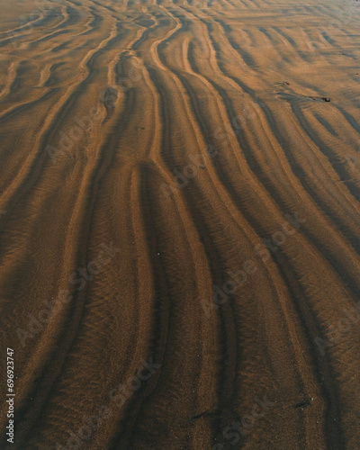Beautiful texture of the sand on the beach