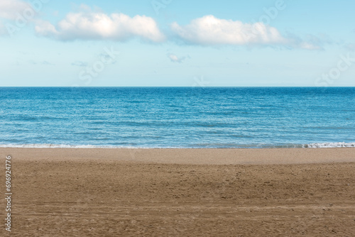 Beautiful sandy beach on sea background. Summer concept.
