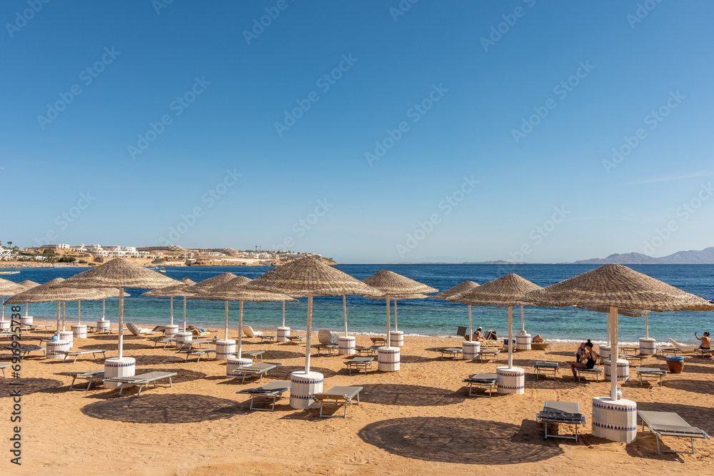 Relax under parasol on the beach of Red Sea, Egypt.