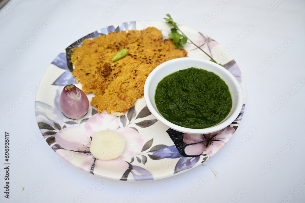 Makki Ki Roti and Sarson Ka Sag. It is Corn floor flat bread and