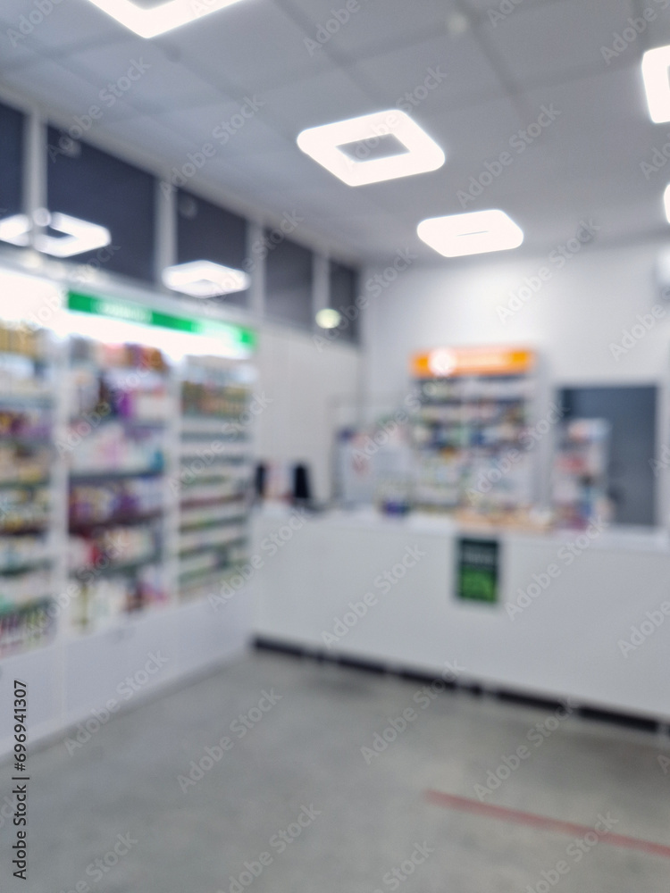 Blurred view of pharmacy interior. Healthcare and cosmetics industry defocused background