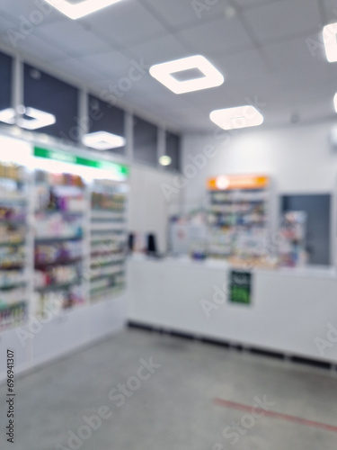 Blurred view of pharmacy interior. Healthcare and cosmetics industry defocused background