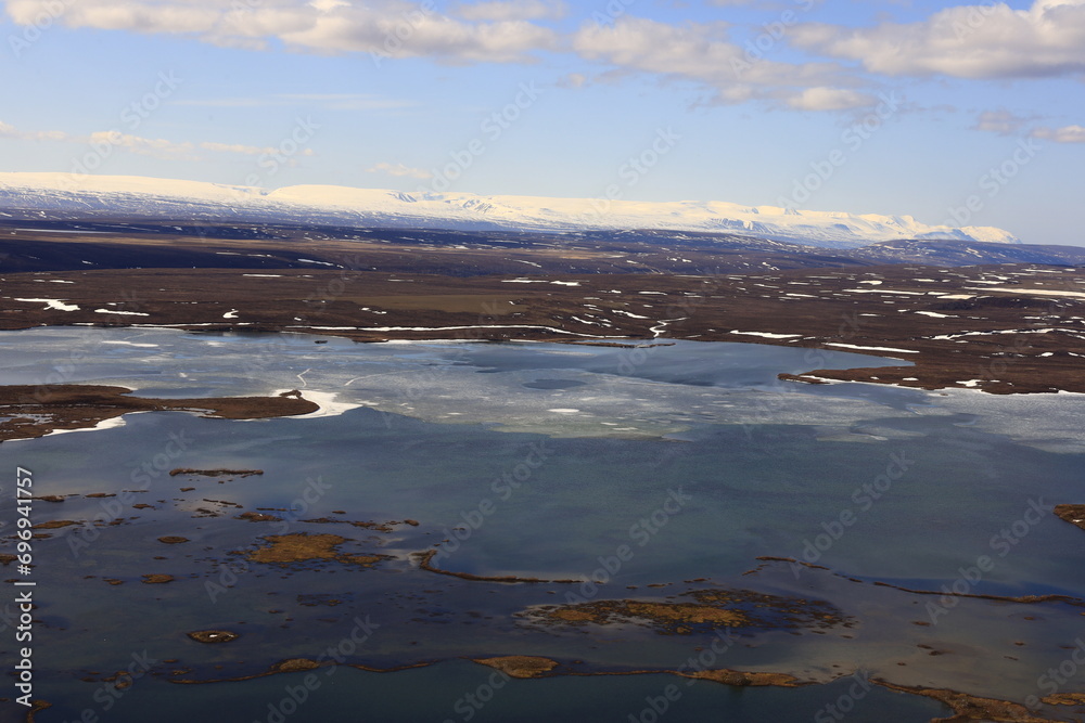 Mývatn is a shallow lake located in an area of active volcanism in northern Iceland, near the Krafla volcano