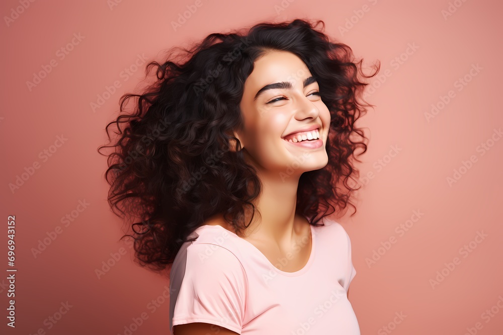 A cute and beautiful young female model with a joyful smile, radiating happiness and charm, against a solid light pink background. A cute and beautiful young female model with a joyful smile, radiating happiness and charm, against a solid light pink background.