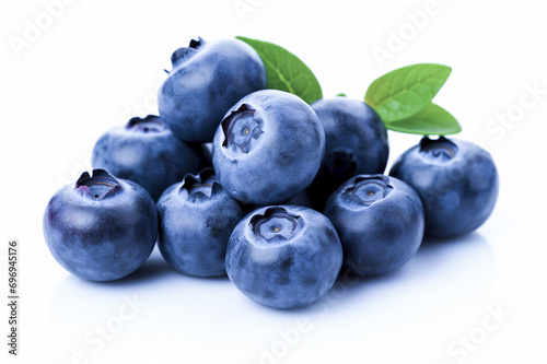 Blueberries with leaves on a white background. Blueberries close up. Blueberries and yogurt. Berries with water drops close-up.