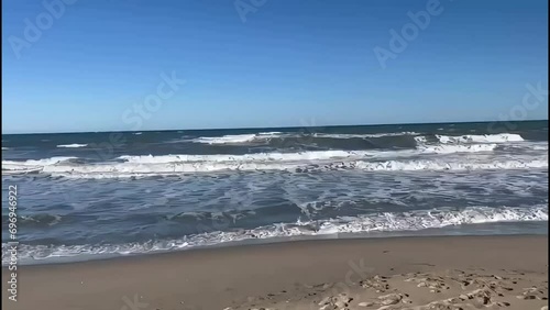 A beautiful shot of Martil beach, an empty lonely sandy beach of Morocco photo