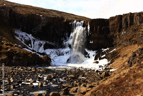 Gufufoss is a waterfall on the heights of the Seydisfjordur fjord located in the east of the icelande photo