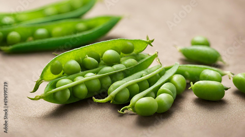 Fresh green pea on wooden table, Heap of fresh pea pods on a wooden table,Peas against white background vertical photo of polka dots, Pods of green peas