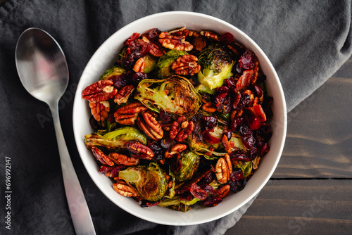 Brussels Sprouts with Bacon, Pecans, and Cranberries: Vegetable side dish made with baby cabbages, toasted pecan halves, and dried cranberries