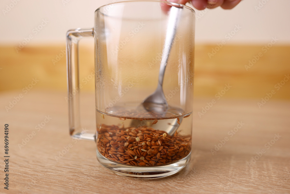 To prepare a therapeutic decoction, flax seeds are shaken in a glass of boiling water. To prepare a therapeutic decoction, flax seeds are shaken in a glass of boiling water.