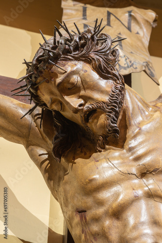 VICENZA, ITALY - NOVEMBER 7, 2023: The detail of carved polychrome statue of Crucifixion in the church Chiesa di Santo Stefano by unknown artist. 