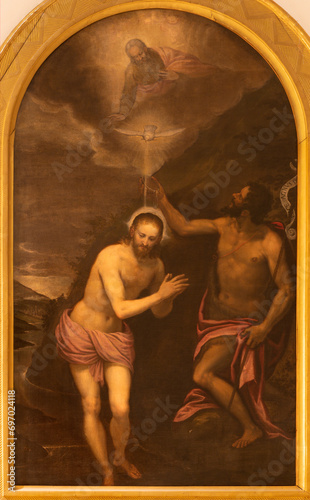 VICENZA, ITALY - NOVEMBER 7, 2023: The painting of Baptism of Jesus in the church Chiesa di Santo Stefano by Alessandro Maganza (1556–1630).