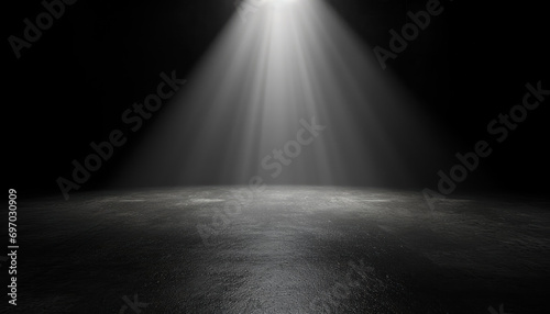 spotlight on empty stage with atmospheric smoke