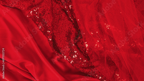 beautiful luxurious red fabric for sewing wedding and fancy dress. Tulle, silk or satin, tulle, tulle mesh. Fashion blog concept. abstract holidays background or elegant wallpaper design.