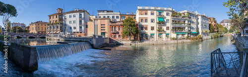 Treviso - The panorama of the old town with the Sile river. photo
