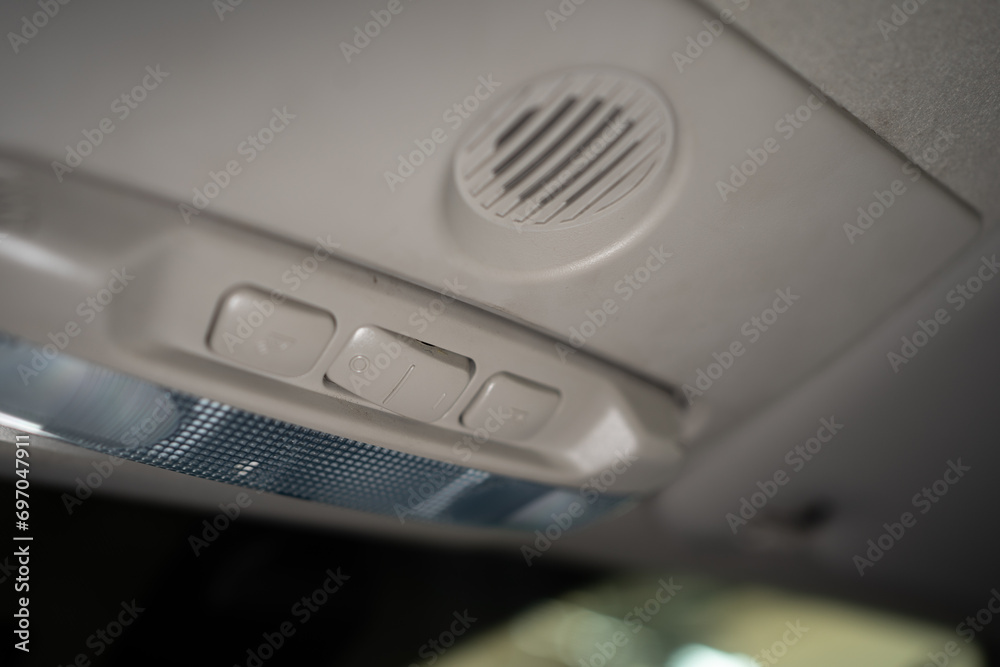 Close-up of Car Interior Ceiling Light Controls