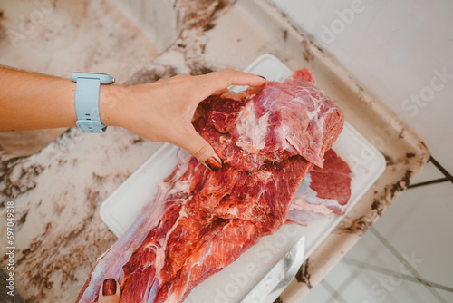 Piece of raw red beef chuck meat with fat. Brazil is the second largest producer and largest exporter of beef in the world..