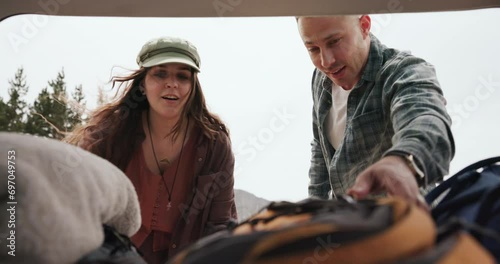 Couple, car and luggage for road trip, travel or holiday with baggage, ready and talking. Man, woman and transport for journey with bag, backpack and happy in nature, woods or vehicle trunk in Spain