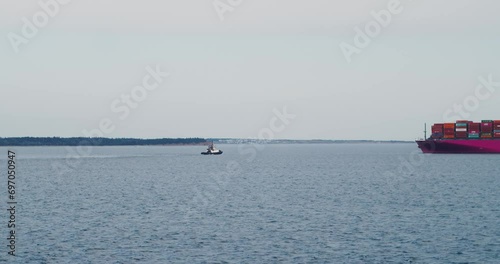 Wallpaper Mural Container cargo ship on the ocean, accompanied by tugboats, entering Halifax. Torontodigital.ca