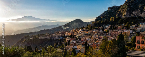 Sunset on Taormina town in Sicily photo