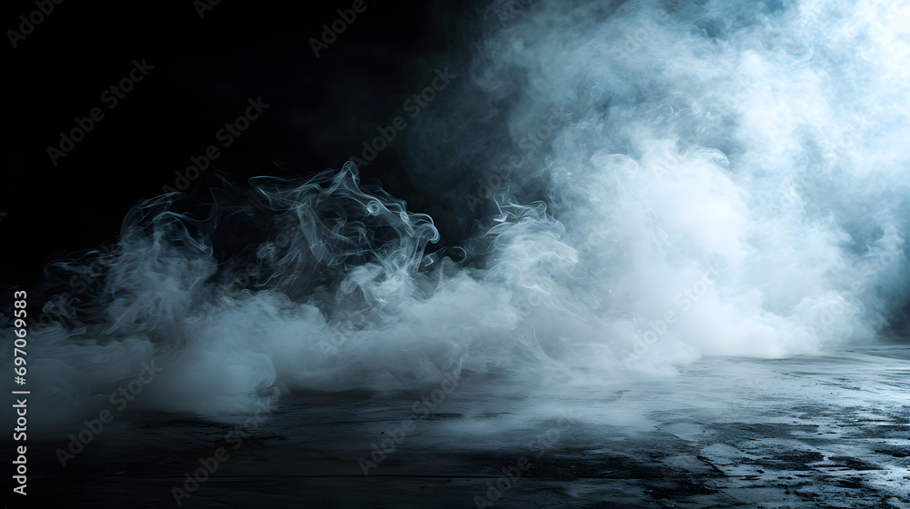 Empty dark background with smoke or fog on the floor.