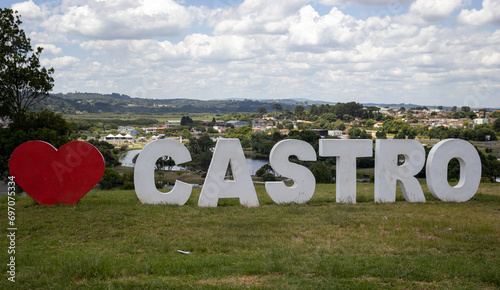 Castro Paraná Brazil Welcome sign at the top of the hill in the city of Castro with an aerial view in the background