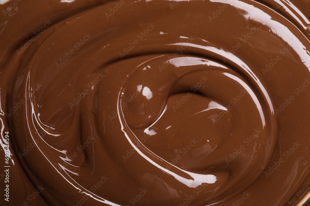 Tasty chocolate paste as background, closeup view Tasty chocolate paste as background, closeup view