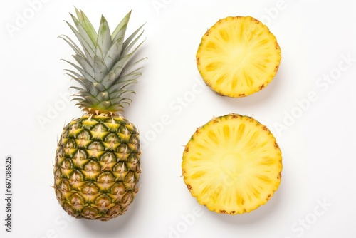 Fresh pineapple whole and cut on white background Top view