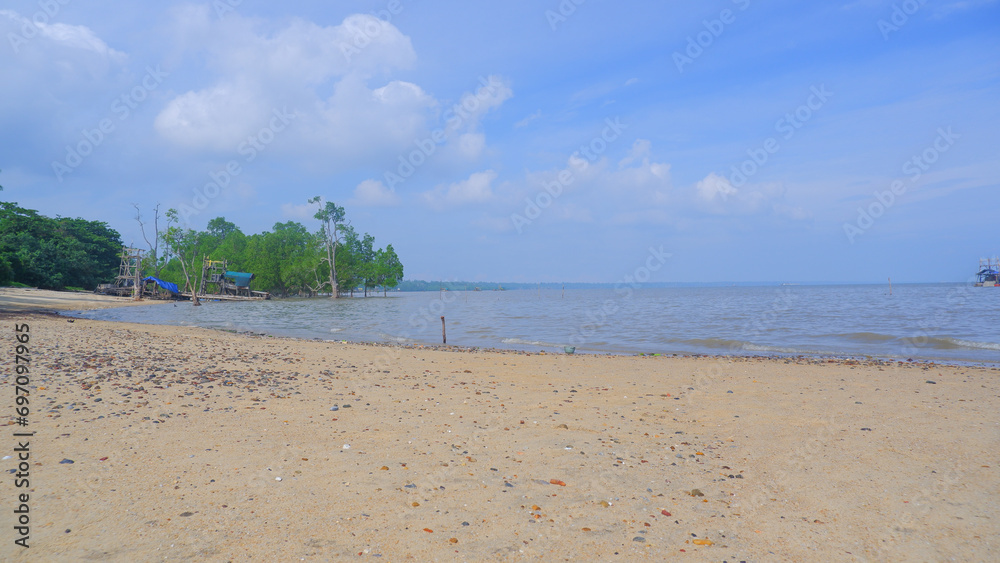 Natural View Of The Yellow Sand Beach When The Sea Water Is Receding, In The Village Of Belo Laut, Indonesia