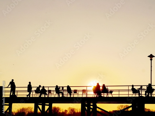 dock sunset people joy in summer