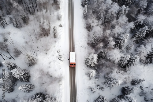a white bus moving on a snowy road around trees covered with snow © DailyLifeImages