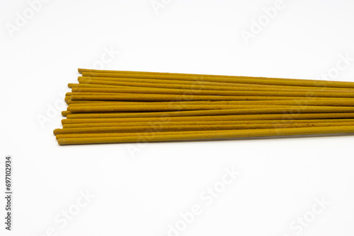 Incense sticks on a white background
