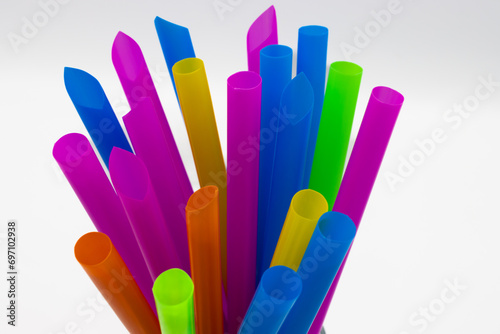 A bunch of multicolored jumbo plastic straws for smoothies, shakes and bubble tea