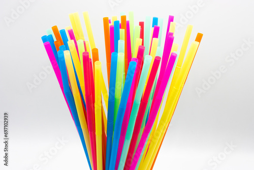 A bunch of multicolored plastic straws