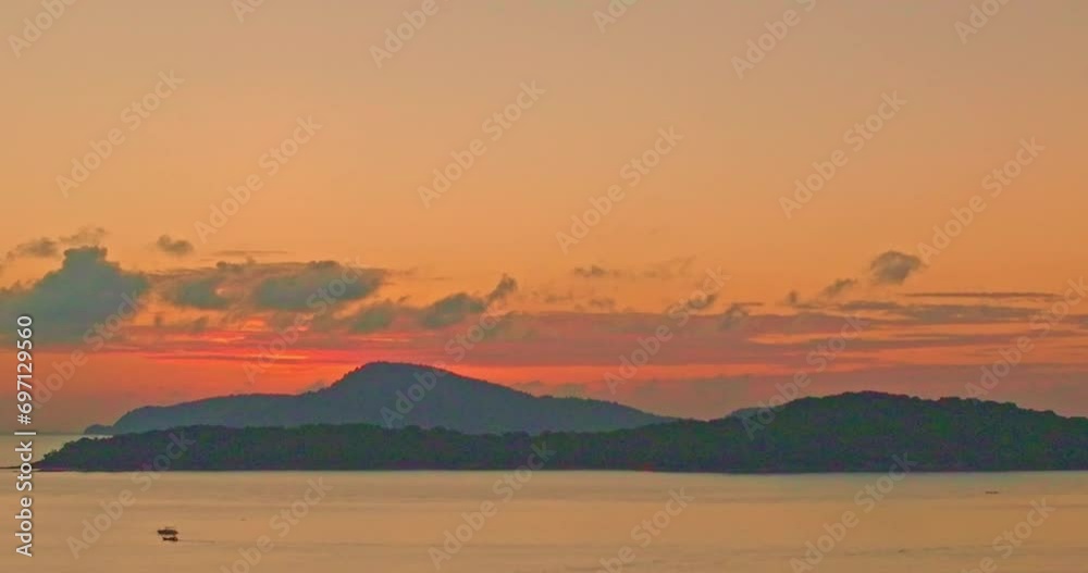.Majestic sunset or sunrise landscape Amazing light of nature amazing cloud scape sky. .beautiful sky reflection of sunrise in sea surfece..stunning colorful sky at yellow sunrise above the islands. .Majestic sunset or sunrise landscape Amazing light of nature amazing cloud scape sky. .beautiful sky reflection of sunrise in sea surfece..stunning colorful sky at yellow sunrise above the islands.