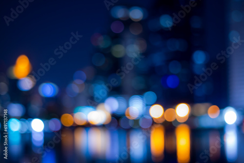 Abstract bokeh night in city background, cityscape at twilight time blurred photo