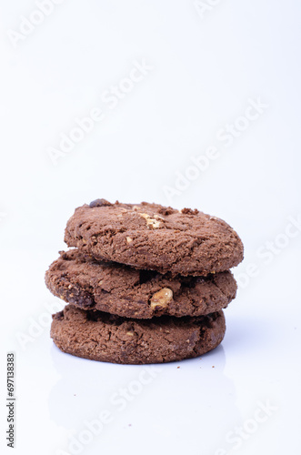 Soft Chewy delicious cookies with chocolate chips, cashew nuts macadamia on white background