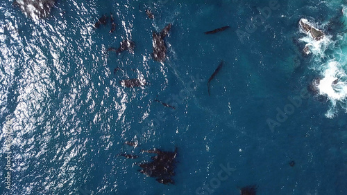 Drone aerial photo of the California coastline with cliffs and rocky beach side coastline