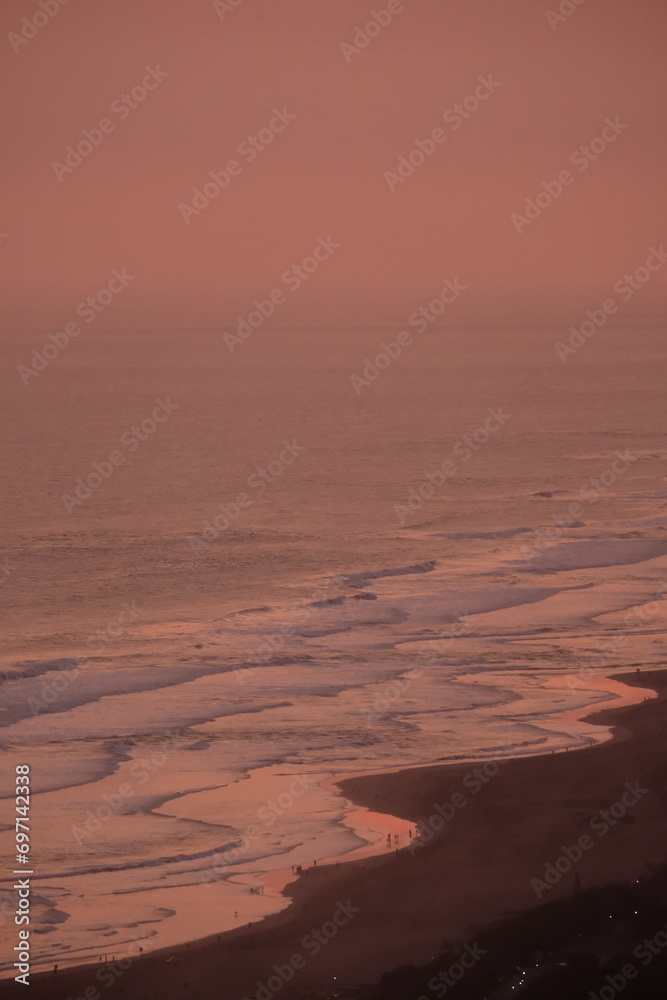 blurred image of aerial view of the beach at dusk. twilight sky.